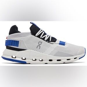 On Running White and Blue Athletic Shoes